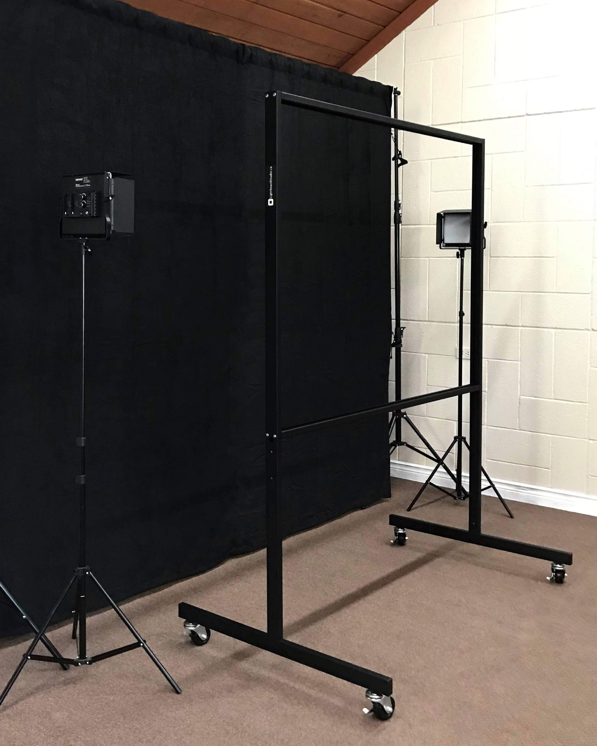 Lightboard Studio Package, a complete production setup with a 72-inch board, professional black backdrop, and adjustable LED studio lighting