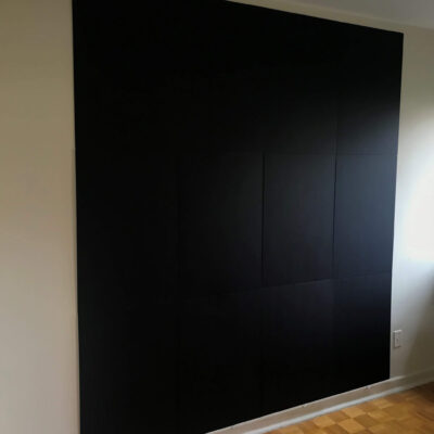 Black backdrop panels viewed from front left