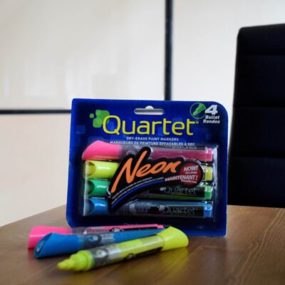 Lightboard pens set on a wooden table