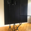 Studio lights from the side with black backdrop and lightboard