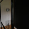 Studio package side view showing lightboard, lights and a black backdrop
