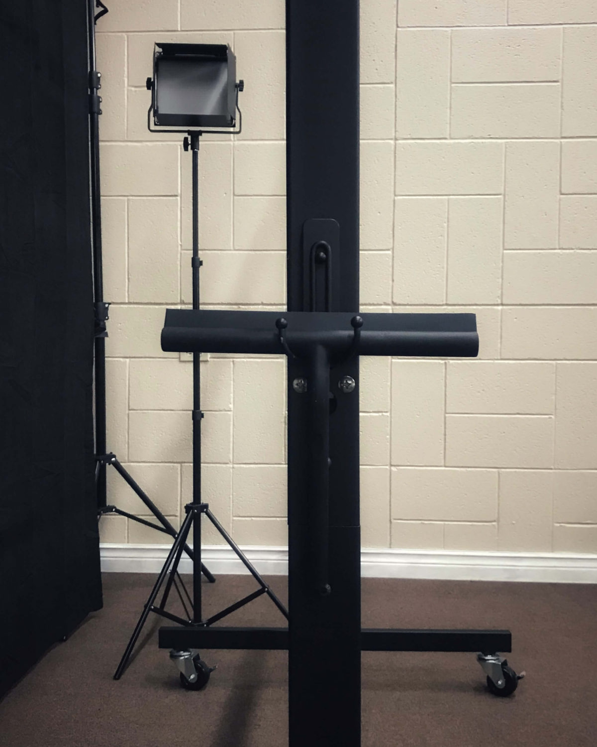 Black squeegee attached to lightboard front view
