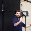 Black squeegee being-used on lightboard