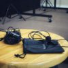 Clip on microphone on table with pouch