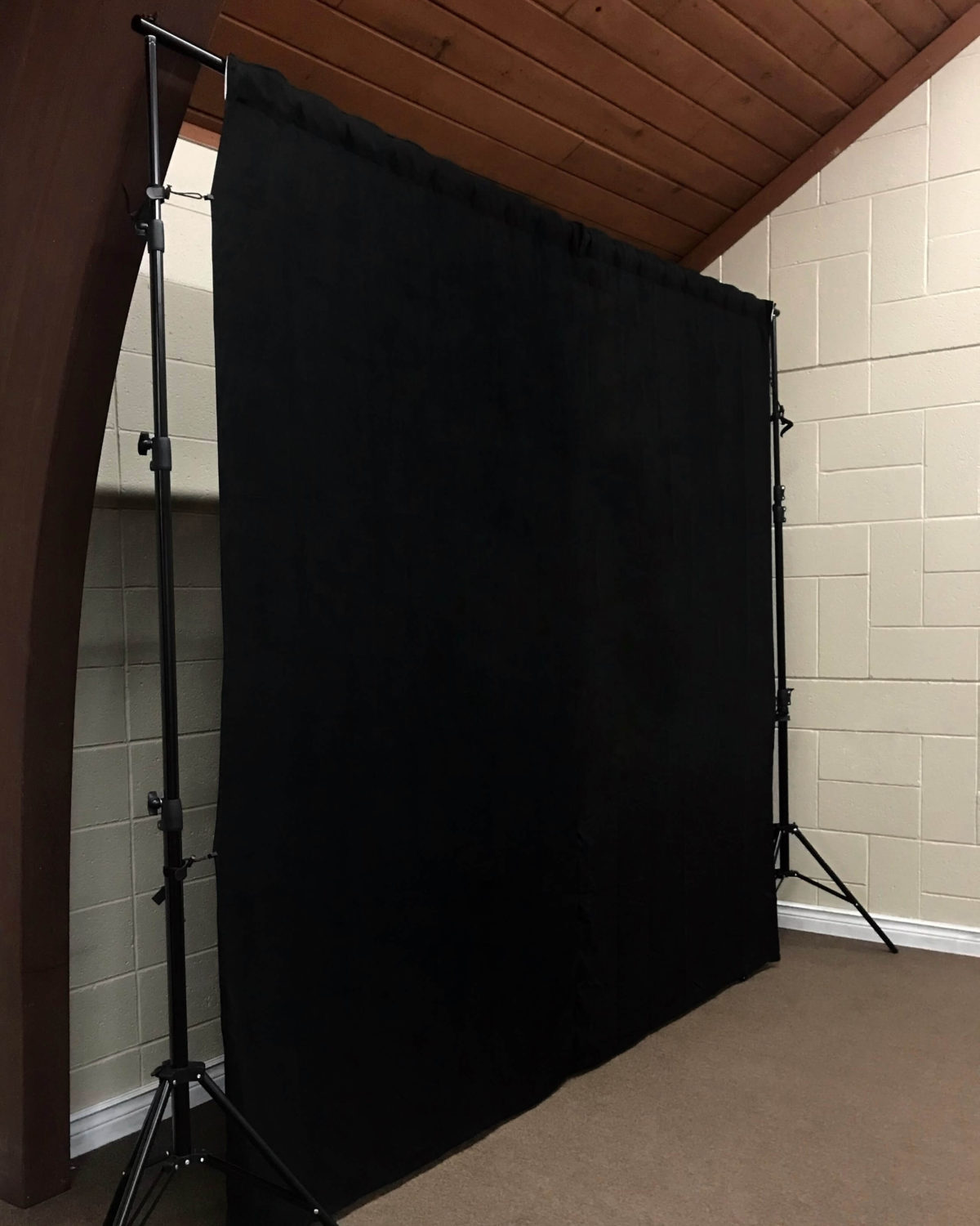 Standalone black backdrop fabric product image side view